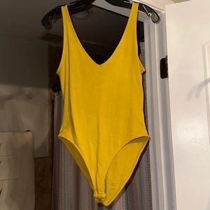 Chartreuse green bodysuit by Forever 21. Size Medium.